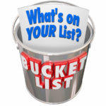 What's On Your Bucket List words on a metal pail to illustrate things you want to do before you die