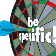 Be Specific 3d words on a dart board to target precise directions and defined goals or objectives for a job, project or task